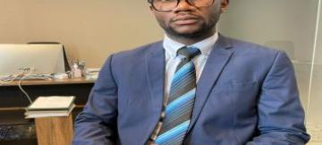 Jonathan Muya Kupa, doctorant en économie (UNIKIN)
