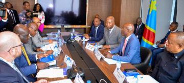 Adolph Muzito avec les partenaires techniques et financiers 