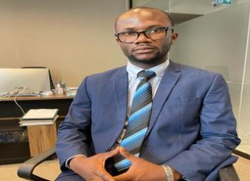Jonathan Muya Kupa, doctorant en économie (UNIKIN)