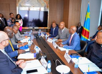 Adolph Muzito avec les partenaires techniques et financiers 